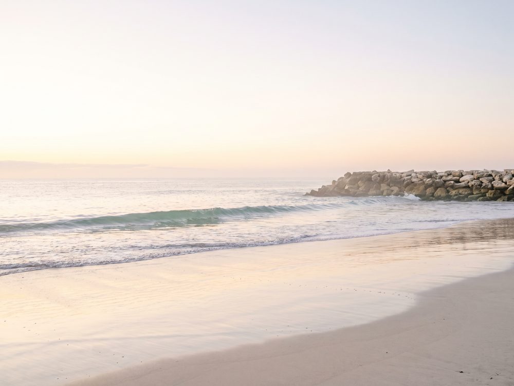 An empty Perth beach at first light